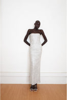 Silver Whispers Gown by YASSMIN SALEH, front view showcasing elegant design and flowing fabric for formal occasions.