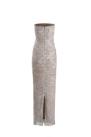 Silver YASSMIN SALEH Whispers Gown with ghostly back design, elegant flowing fabric, perfect for formal occasions.