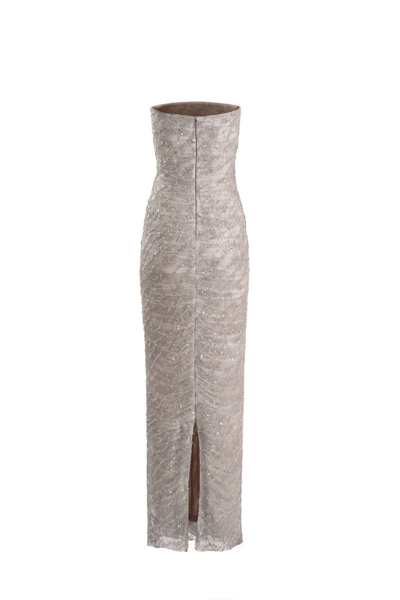 Silver YASSMIN SALEH Whispers Gown with ghostly back design, elegant flowing fabric, perfect for formal occasions.