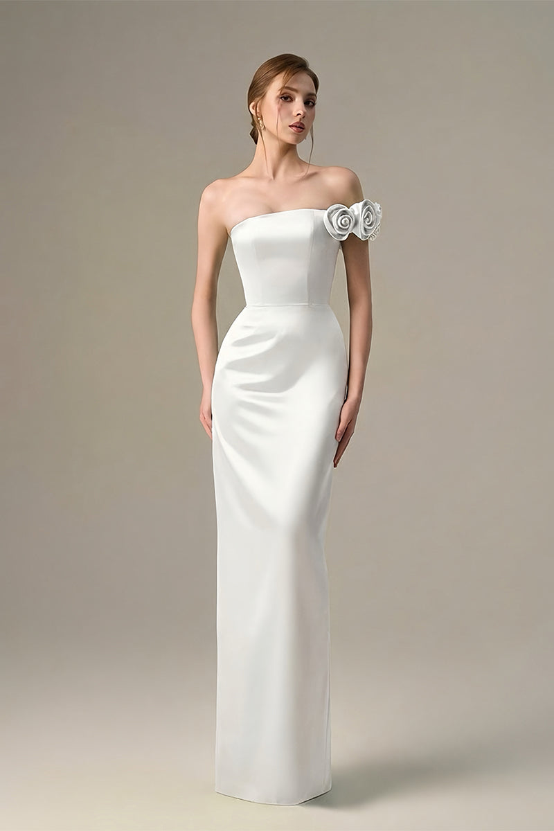 White I.H.F maxi dress with a bustier style and satin floral appliqué, elegant and flowy for formal occasions.