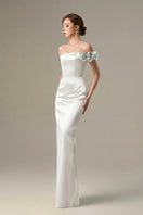 White satin floral appliqué bustier gown by I.H.F, featuring elegant design and intricate floral details.