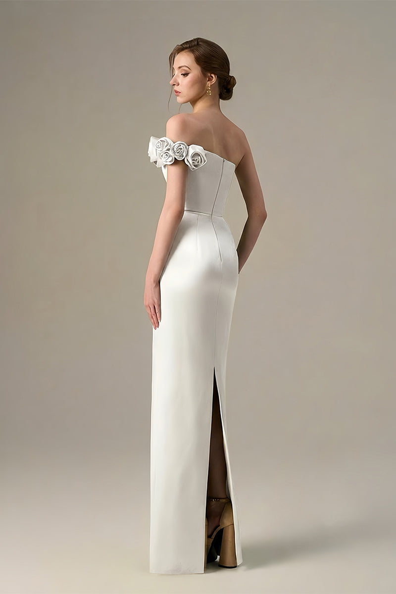 White I.H.F maxi bustier gown with satin floral appliqué, featuring elegant design and fitted bodice for formal occasions.