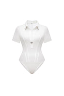 White Montsand corset polo shirt, fitted shirt with a structured corset design and classic polo collar, displayed on a plain background.