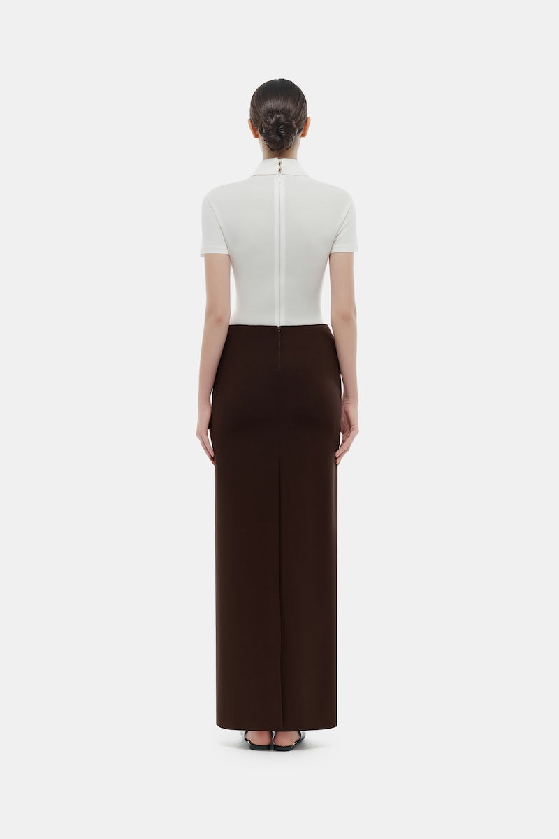 White corset polo shirt from Montsand featuring a fitted design, short sleeves, and a classic collar.