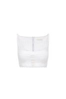 White Montsand crop top featuring a fitted design, short sleeves, and a stylish neckline, perfect for casual or trendy outfits.