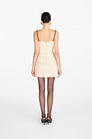 White Montsand Margo midi dress, elegant mini dress with a flowing silhouette, perfect for stylish occasions.