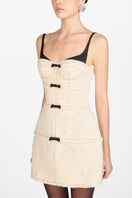 White Montsand Margo midi dress featuring a sleek, fitted design perfect for casual or semi-formal occasions.