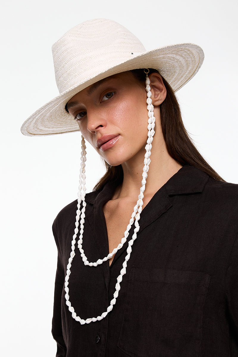 White Panama fedora hat by LE SH KA with a classic wide brim and woven straw design, perfect for sunny weather.