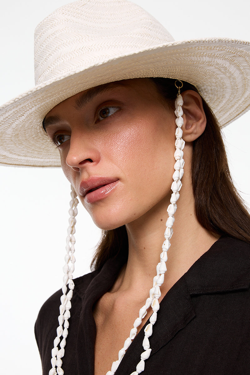 White Panama Fedora hat by LE SH KA featuring a wide brim and classic style, perfect for sun protection and fashion.