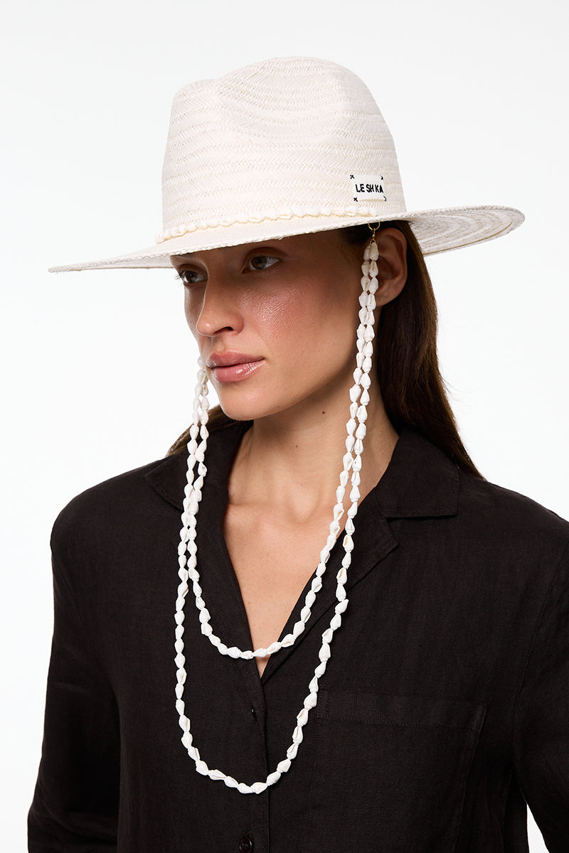 White Panama fedora hat by LE SH KA featuring a classic wide brim and stylish design, perfect for sun protection and fashion.