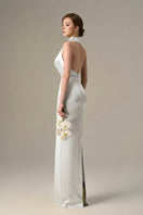 White satin silk halter gown with pleated detailing by I.H.F, featuring a sleek design and elegant neckline.