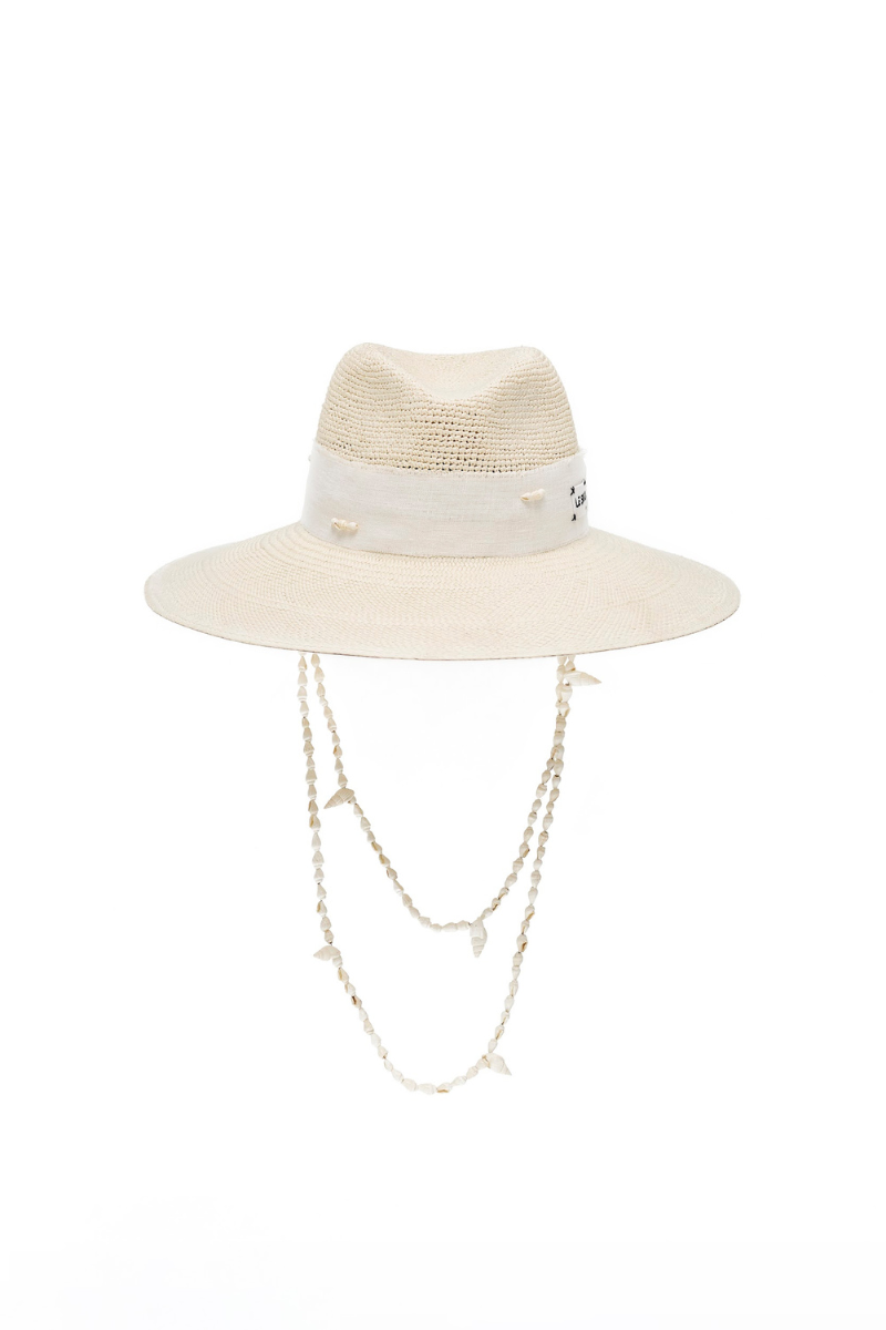 White Seashell London hat by LE SH KA, stylish white hat with seashell accents, perfect for beach or casual wear.
