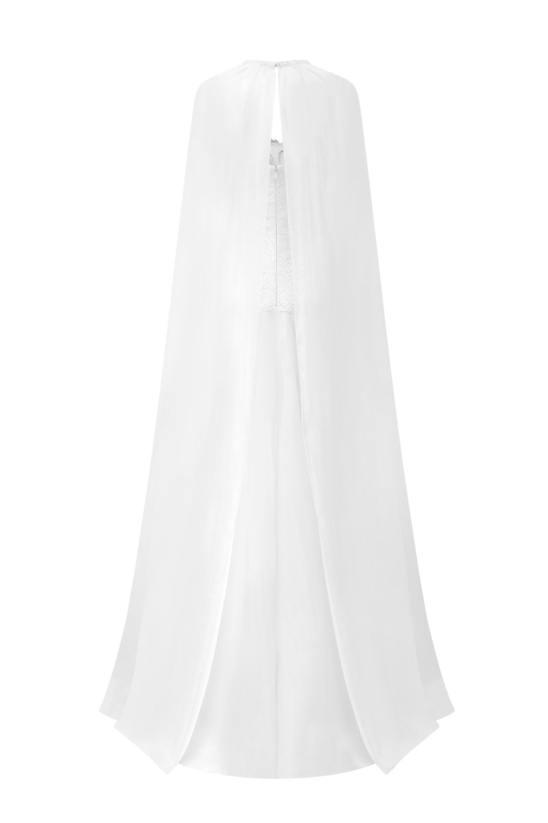 White taffeta maxi dress with cape by Tracy Studio, featuring elegant flowing fabric and stylish evening wear design.
