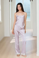 Windy women's silk 3-piece pajama set in purple, featuring a top, bottoms, and matching sleepwear accessories by MANITO.