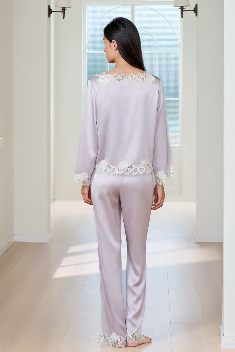 Windy Women's silk 3-piece pajama set in purple, featuring a comfortable top, bottoms, and matching sleepwear accessories.