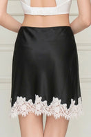 Black Windy Women's Silk Short Skirt by MANITO, featuring a sleek, smooth silk fabric and fashionable mini length.