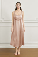 Pink silk wide-strap women's nightdress by MANITO, maxi style with flowing fabric and elegant design.