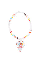 White With Love short necklace by Pájara Pinta featuring a delicate chain and small pendant, styled for casual or elegant outfits.