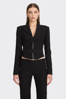 Black wrap blazer from Stolen Stores featuring a tailored fit, lapel collar, and long sleeves, styled on a model.