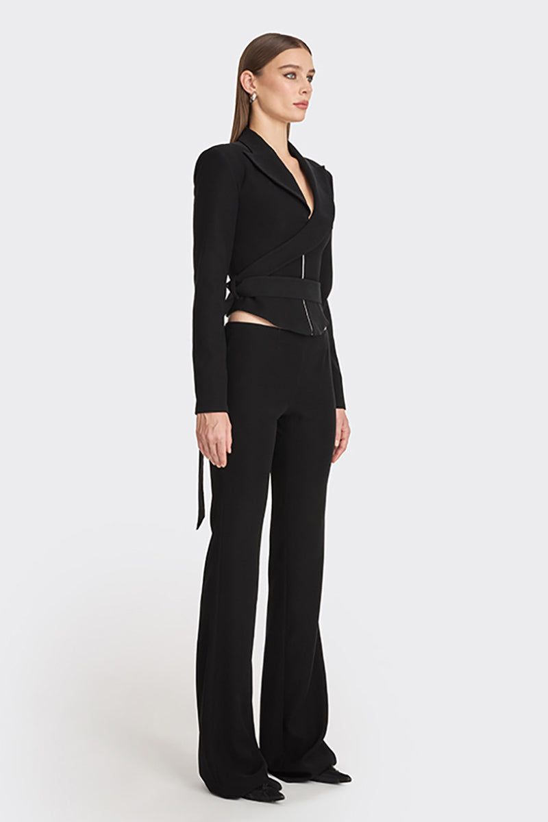 Black wrap blazer by Stolen Stores, featuring a tailored fit and stylish lapel, shown on a model.