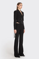 Black wrap blazer by Stolen Stores, featuring a tailored fit and stylish lapel, shown on a model.