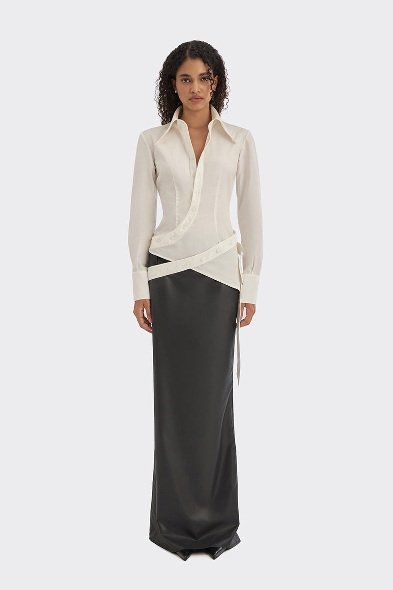 White wrap button shirt by Stolen Stores, featuring a stylish collar and long sleeves, displayed on a mannequin.