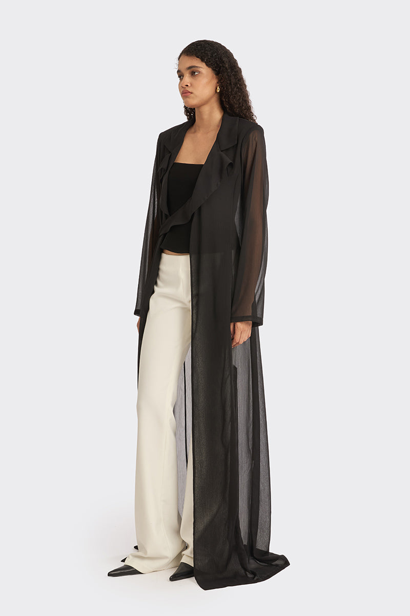 Black sheer wrap outerwear robe by Stolen Stores, featuring lightweight, flowing fabric perfect for stylish layering or lounge wear.