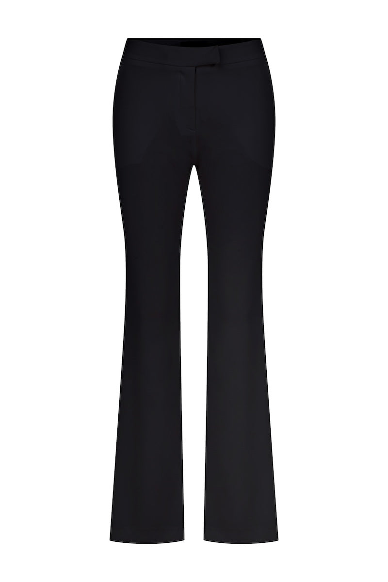 Black Arced straight cut trousers by Nazlı Ceren, showcasing a sleek fit and modern design on a model.