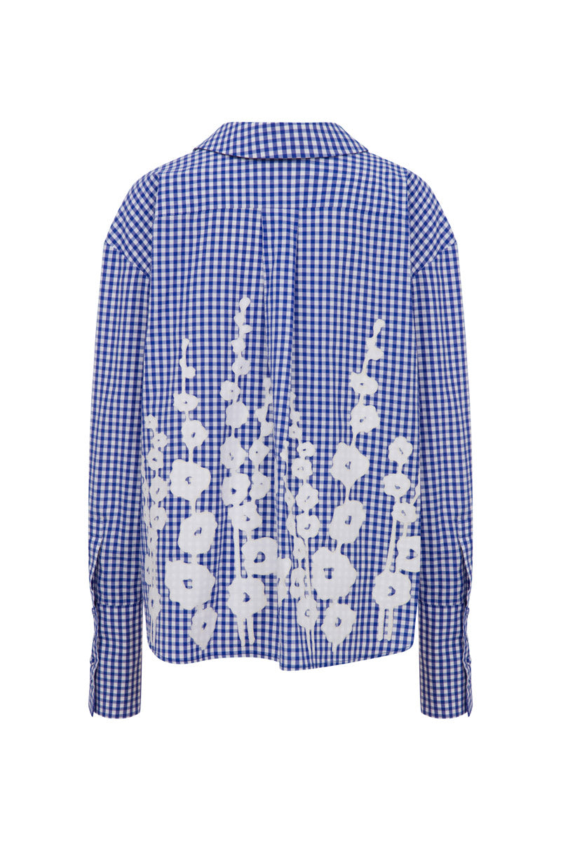 TAGG oversized poplin gingham shirt with embroidery, featuring a relaxed fit and detailed stitching on the front.