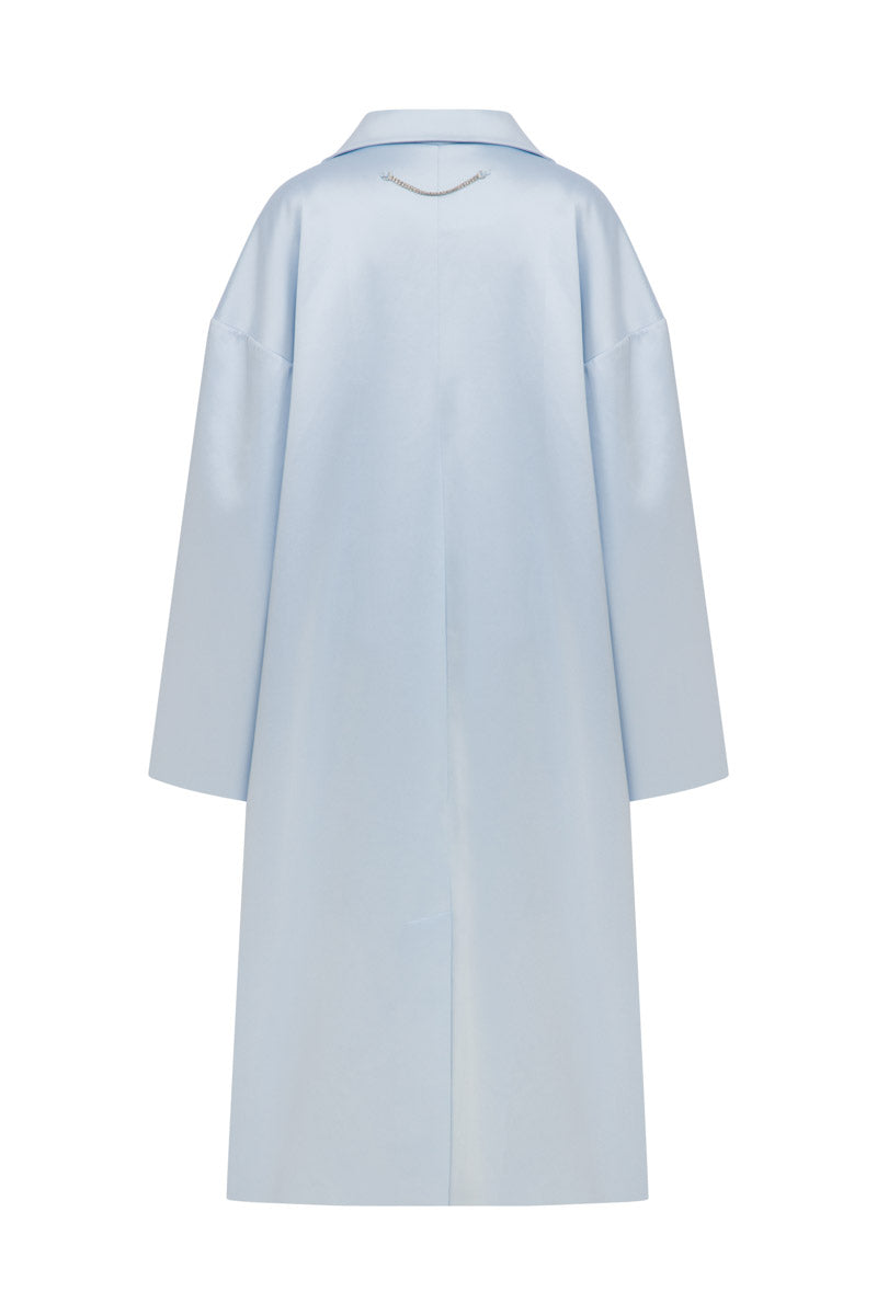 Embroidered baby blue satin coat by TAGG, featuring detailed embroidery and a smooth, shiny satin finish for infants.