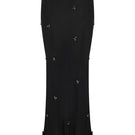 Embroidered maxi skirt in crinkled chiffon by TAGG, flowing and textured fabric with intricate embroidery details.