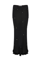 Embroidered maxi skirt in crinkled chiffon by TAGG, flowing and textured fabric with intricate embroidery details.