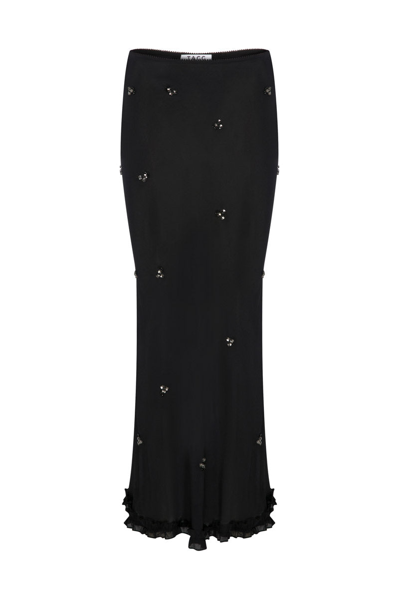 Embroidered maxi skirt in crinkled chiffon by TAGG, flowing and textured fabric with intricate embroidery details.