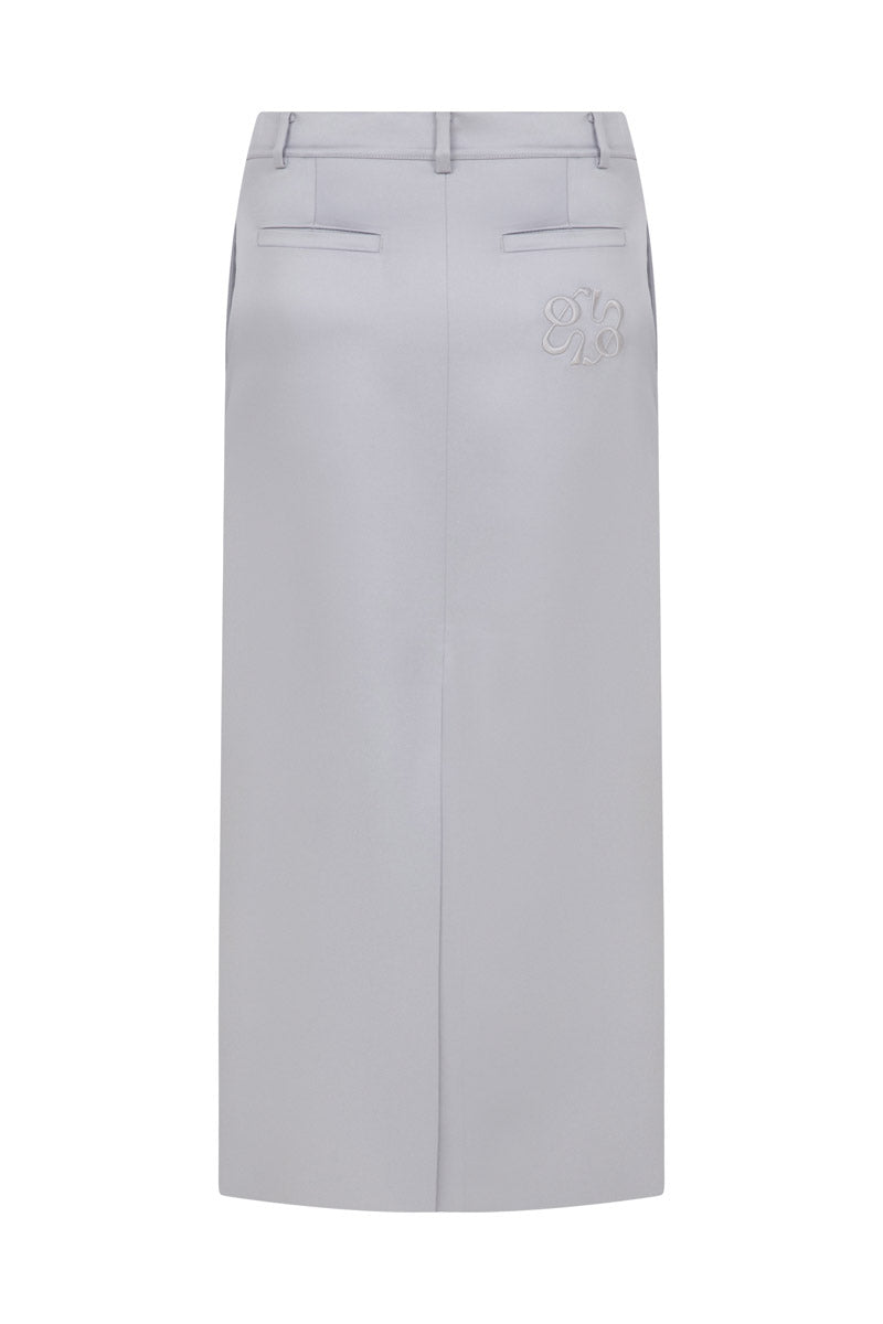 TAGG structured silver satin maxi skirt with a flowing design, featuring a smooth, shiny fabric and elegant silhouette.