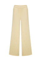 Tagg oversized pants with crystal embroidery, featuring wide-leg style and intricate beaded detailing on soft fabric.