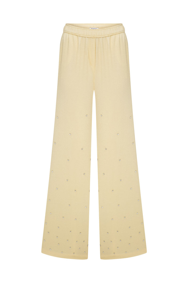 Tagg oversized pants with crystal embroidery, featuring wide-leg style and intricate beaded detailing on soft fabric.