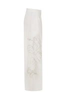 Tagg cotton pants with intricate embroidery, featuring a relaxed fit and stylish design for everyday wear.