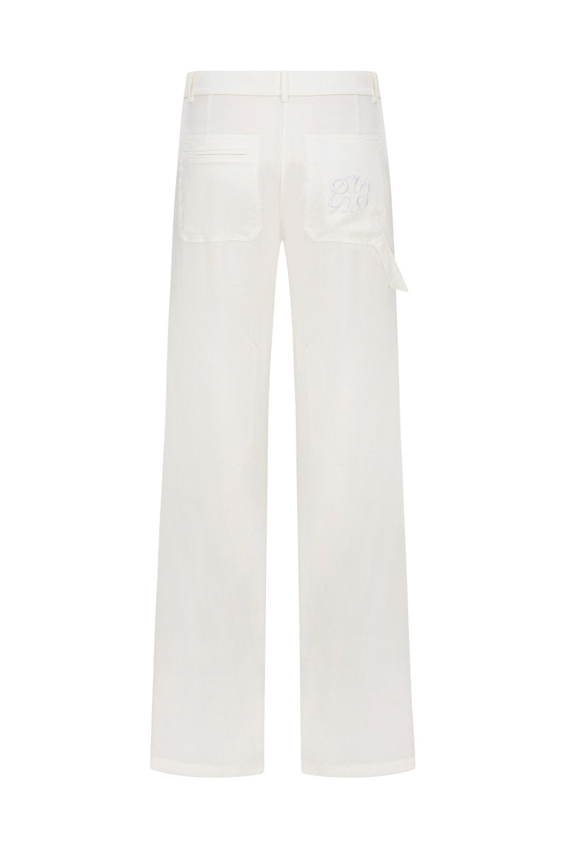 TAGG satin cargo pants with embroidery, featuring a stylish fit and detailed design, shown in a close-up view.