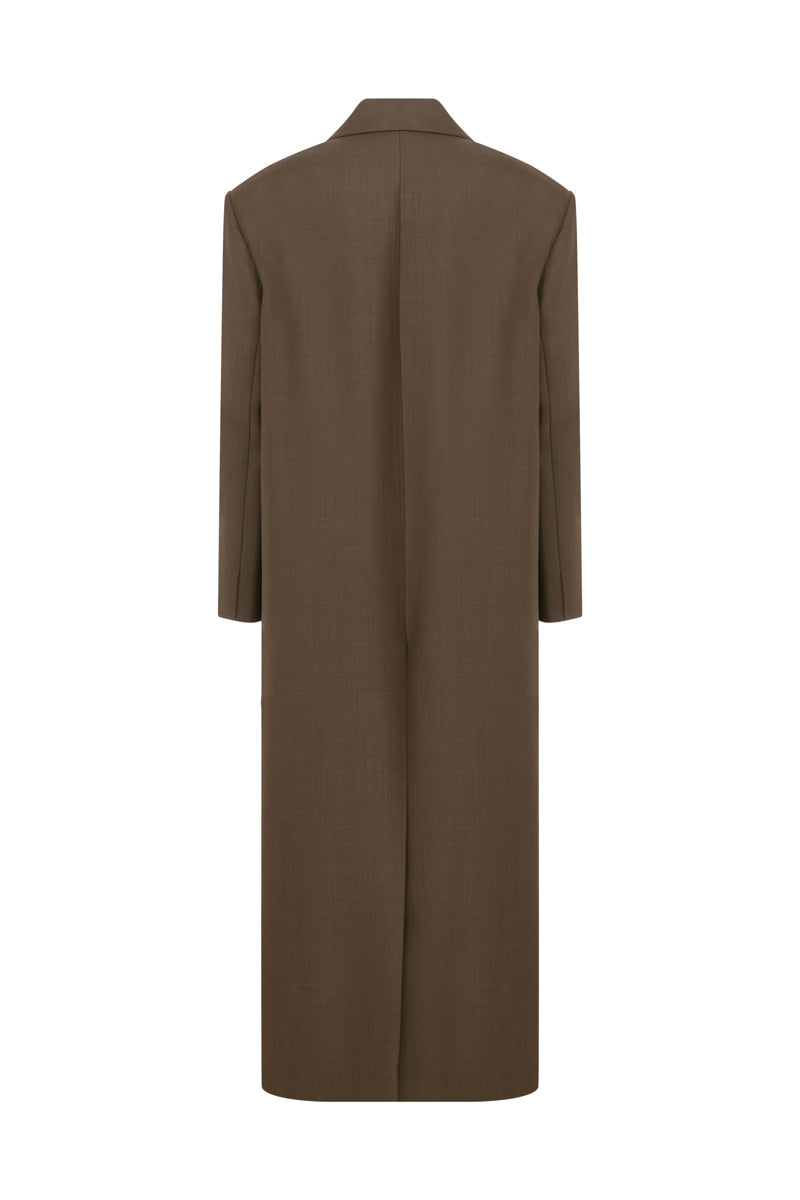 Brown oversized double-breasted wool coat by TAGG, featuring wide lapels and a relaxed fit, displayed on a hanger.