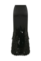 Black embellished mermaid maxi skirt by TAGG, featuring fitted waist and flowing fabric with decorative embellishments.
