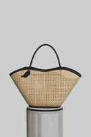 Black XL Cella Chair shoulder bag by Folklore The Label, showcasing its spacious design and stylish leather finish.