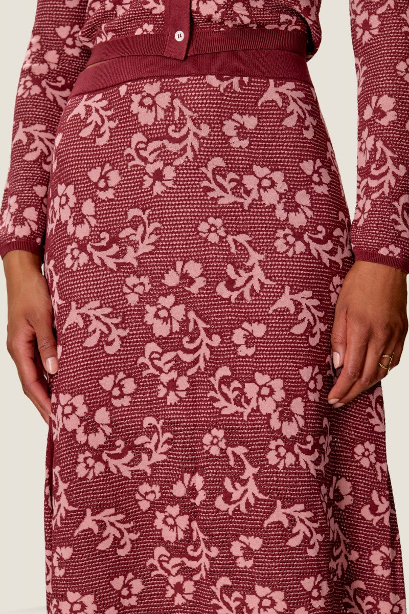 Rebecca Taylor Bryn jacquard midi skirt in blush with intricate pattern and tailored fit, shown on a dress form.
