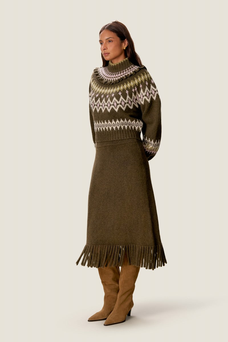 Rebecca Taylor Emelia fringe sweater midi skirt in olive, showing the textured knit fabric with fringe details at the hem.