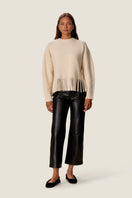 Rebecca Taylor Emelia fringe sweater in alabaster, featuring a cozy knit with fringe details, displayed on a neutral background.