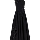 AISA luminous gown with flowing fabric and intricate detailing, showcased on a dress form against a neutral background.