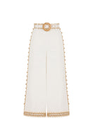 A pair of white natural AISA Dune pants with a relaxed fit, featuring a smooth fabric and stylish design.