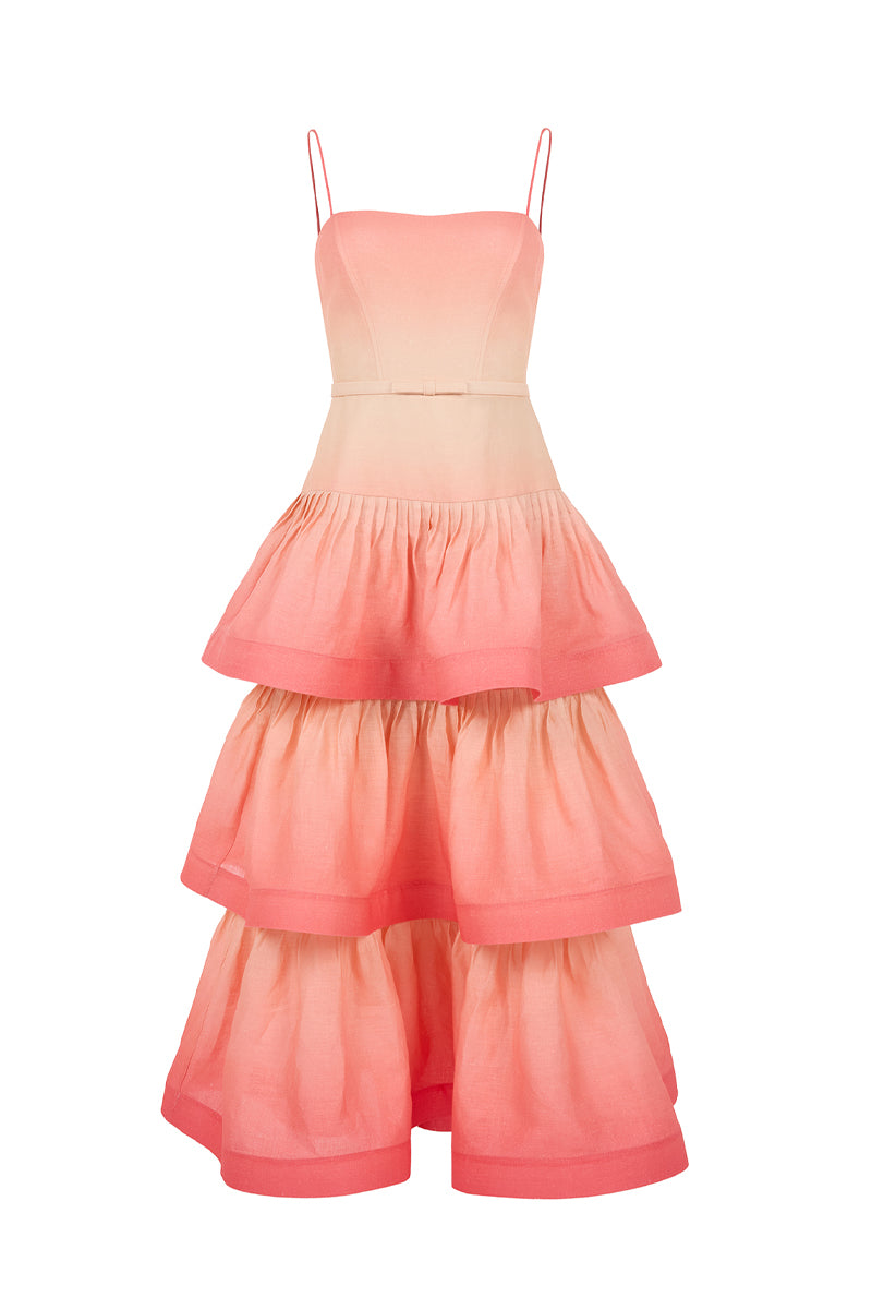 AISA Coralie maxi dress in coral with flowing fabric and elegant design, displayed on a mannequin.