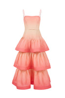 AISA Coralie maxi dress in vibrant coral color, flowing fabric with a stylish neckline, perfect for summer or special occasions.