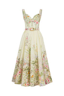 AISA Gardenia floral midi dress displayed on a hanger, showcasing its lightweight fabric and vibrant floral pattern.