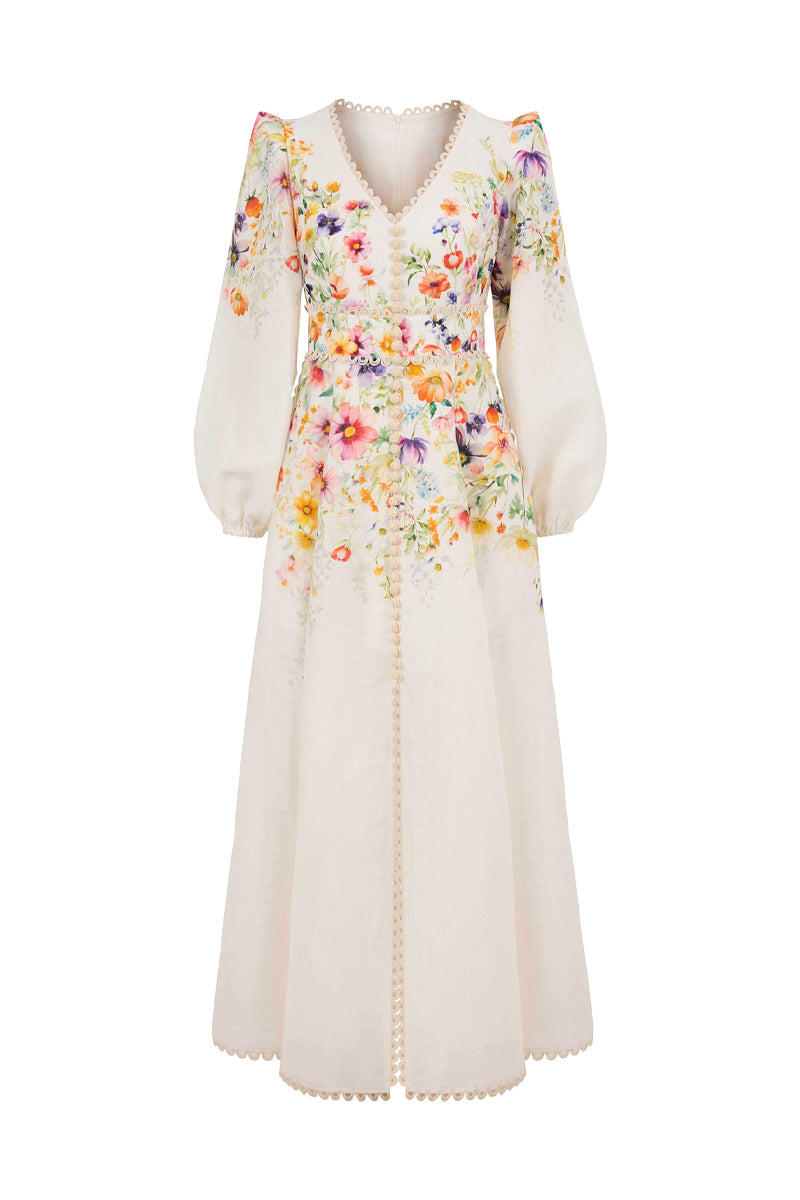 AISA Botanica maxi dress featuring a floral print, flowing fabric, and sleeveless design on a model.